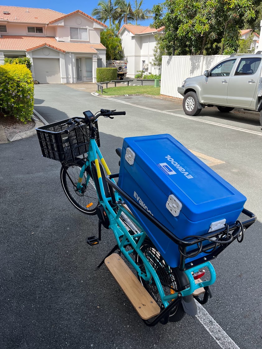 An esky mounted on the the tail of the Evamos.